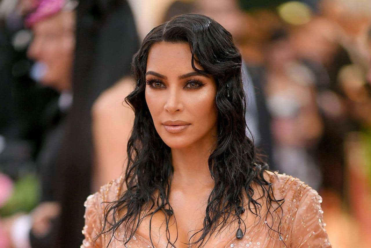 Unveiled: Why Does Kim Kardashian Always Wear Gloves?